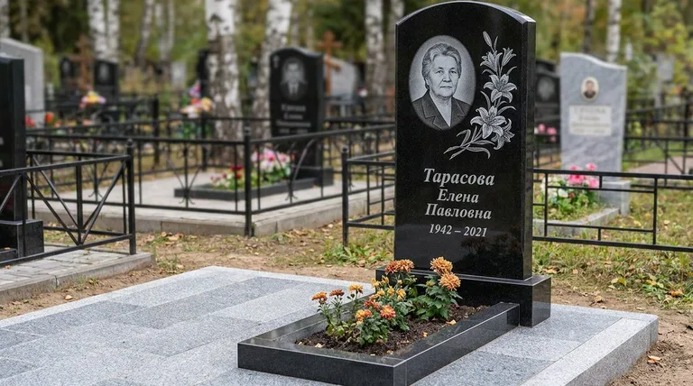 Памятник с гравировкой лилий — выполненная работа «Тарасова» в Южно-Сахалинске