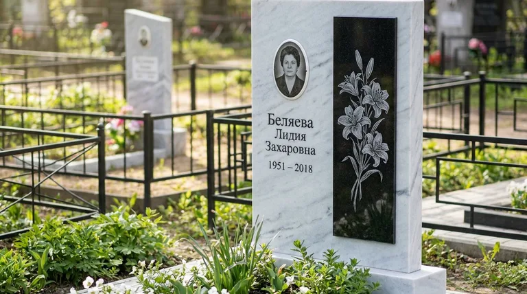 Памятник с гравировкой лилий — выполненная работа «Беляева» в Южно-Сахалинске