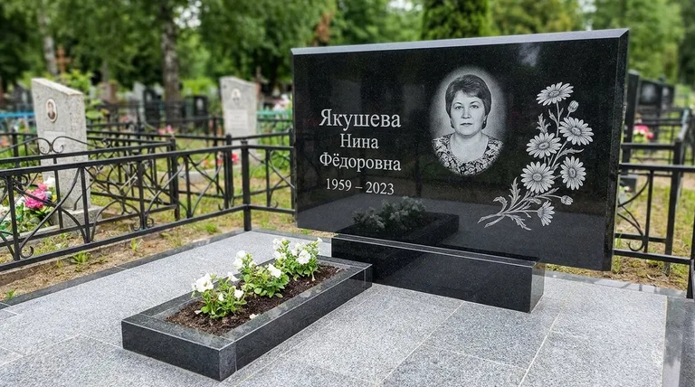 Памятник с гравировкой ромашек — выполненная работа «Якушева» в Южно-Сахалинске