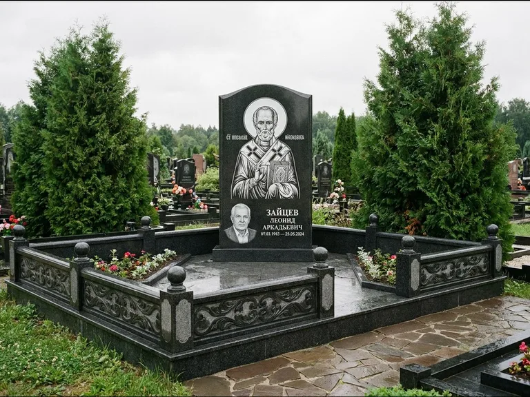 Памятник с гравировкой иконы: стела с гранитным столиком и скамьёй — Архангел Михаил на стеле, семейный участок с плиткой, работа «Верещагина» в Южно-Сахалинске